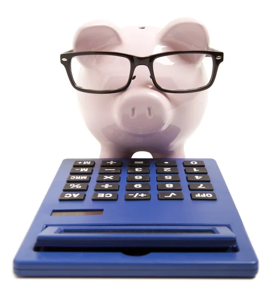 Piggy bank and calculator — Stock Photo, Image