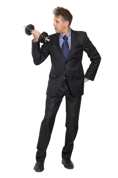 Businessman with dumbbell — Stock Photo, Image