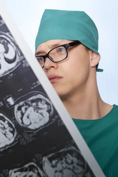 Doctor examines X-ray human brain — Stok fotoğraf