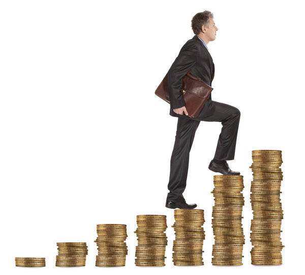 Businessman goes up coins