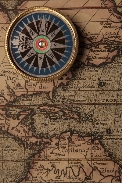 Compass and Chess on old map Stock Photo by ©kwanchaidp 75914687