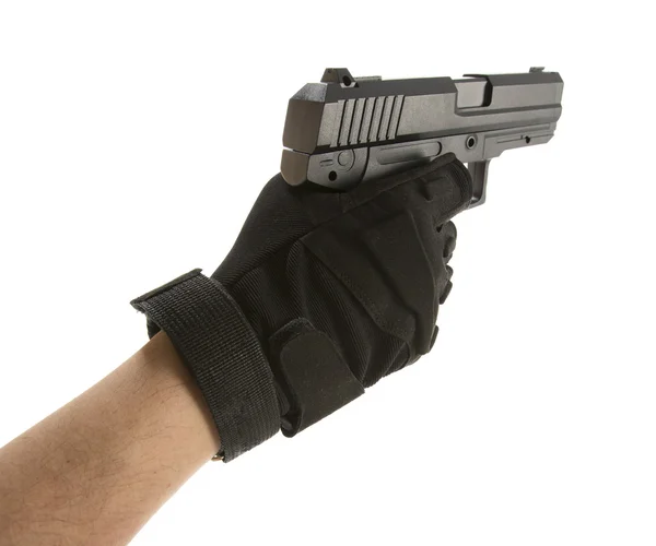 Mão de homem segurando arma — Fotografia de Stock
