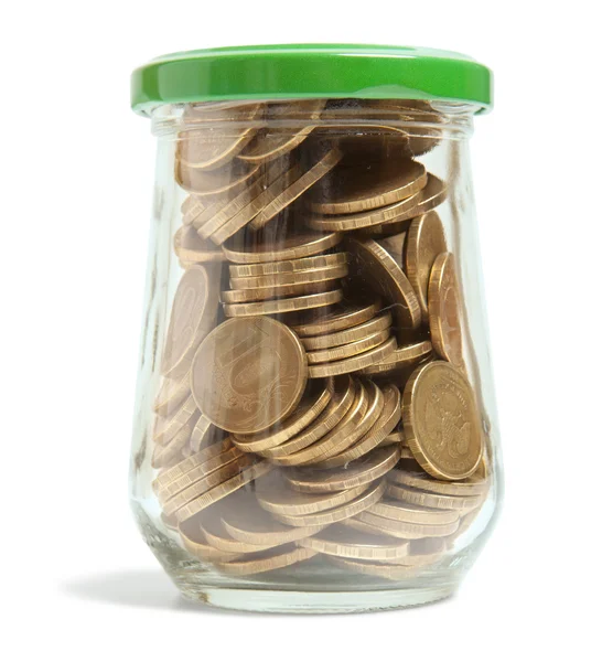 Coins in a glass jar — Stock Photo, Image