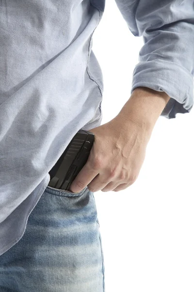 Homem segurando uma arma — Fotografia de Stock