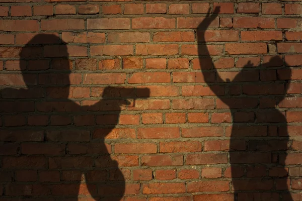 Human silhouette with handgun — Stock Photo, Image