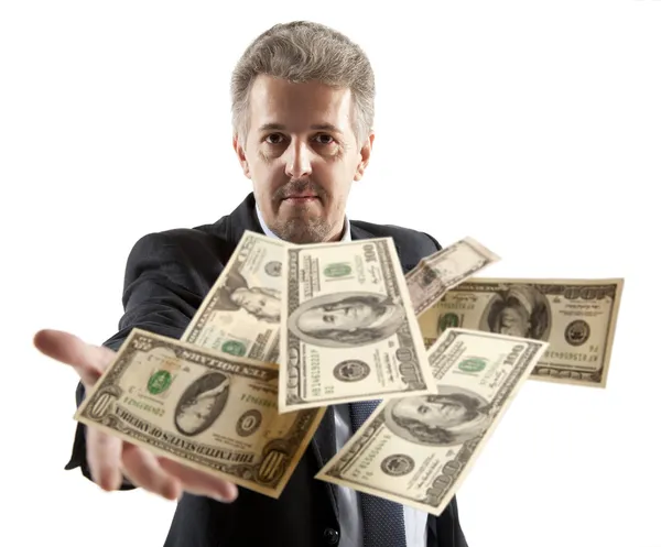 Businessman throwing dollar — Stock Photo, Image