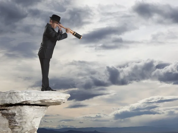 Businessman and telescope — Stock Photo, Image