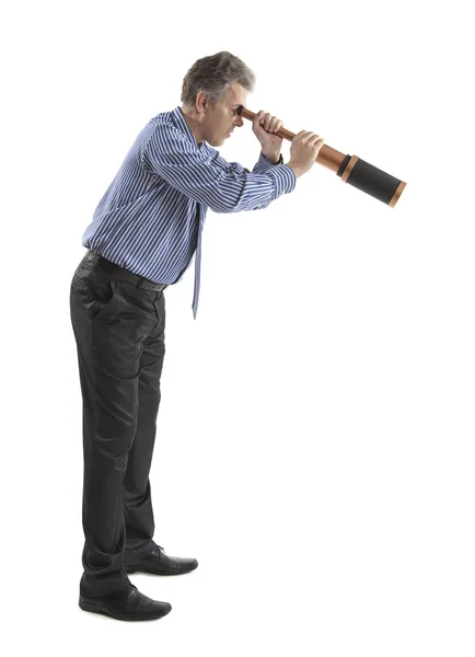 Hombre de negocios mira un telescopio —  Fotos de Stock