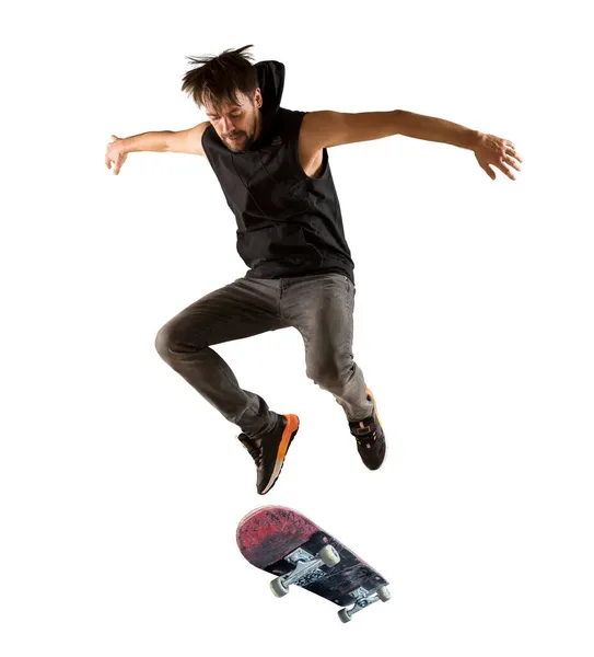 Skateboarder Doet Een Sprongtruc Geïsoleerd Witte Achtergrond — Stockfoto