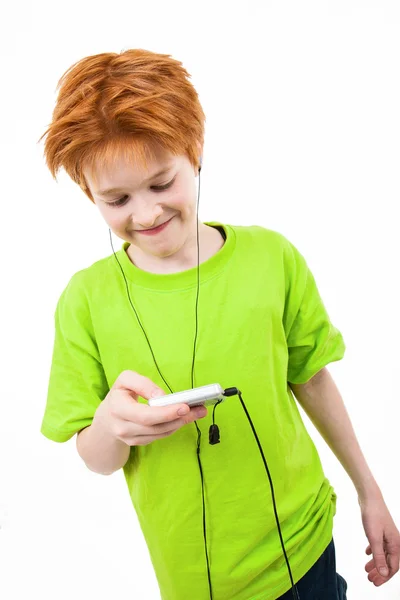 Red teen listens to music — Stock Photo, Image