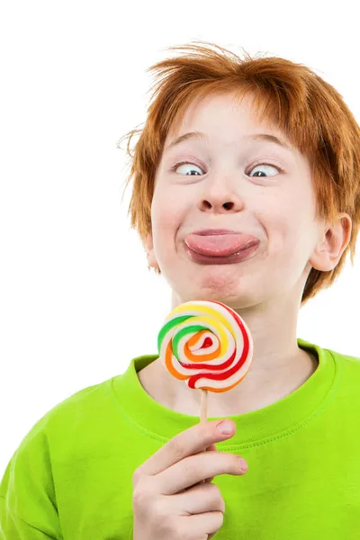 The red teenager with a sugar candy — Stock Photo, Image