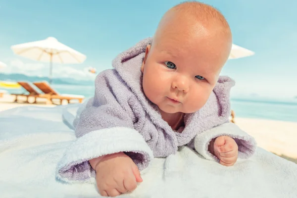 Baby in bathrobe — Stock Photo, Image