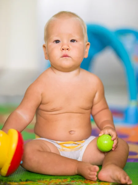 Baby with toy — Stock Photo, Image