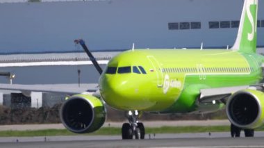 S7 Airlines arrival, taxi to the terminal