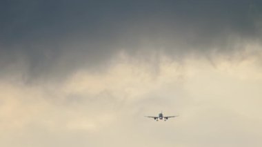 Airplane in the sky, long shot