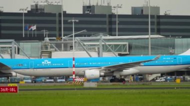 Side view, KLM airplane at taxiway