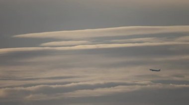 Long shot airplane in the sky