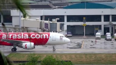 Airplane AirAsia taxiing