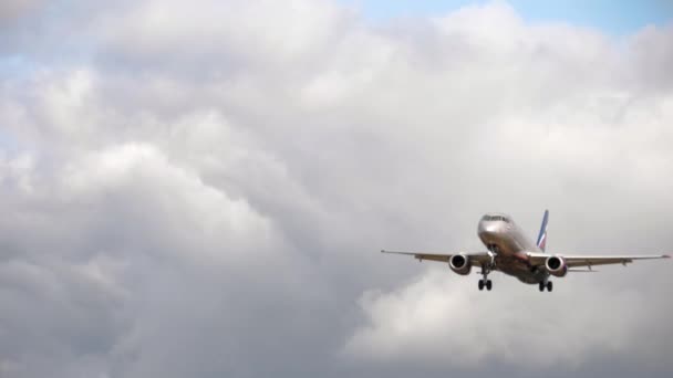 Aeroflot flies in the cloudy sky — Wideo stockowe
