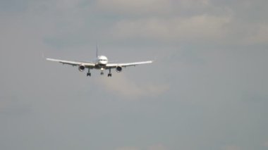 Jet plane descending, haze