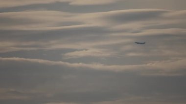 Cloud landscape and plane