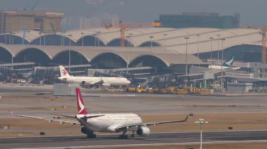 Plane Cathay Dragon take off