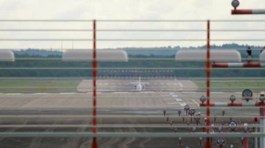 Airplane taking off, end of the runway