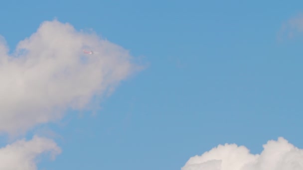 Airplane Nordwind flies in the clouds — Vídeo de stock