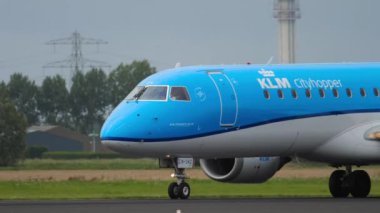 Airplane of KLM Cityhopper landing