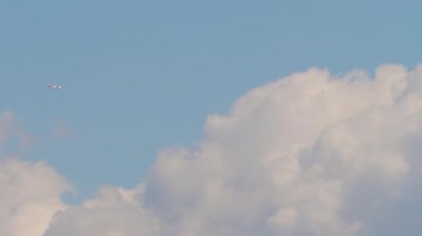 Long shot airplane in the sky