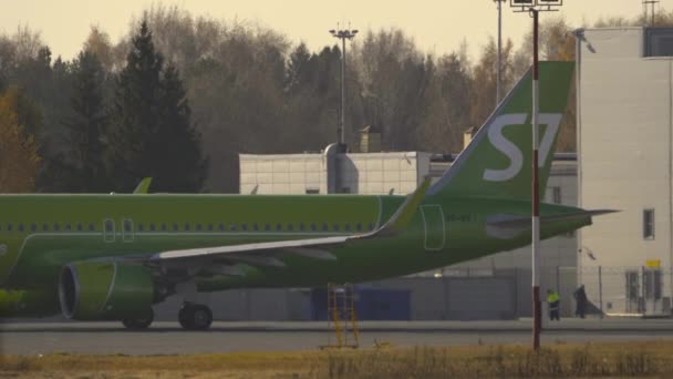 Airplane of S7 airlines taxiing — Stock Video