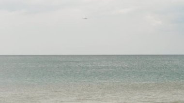 Airliner over the ocean