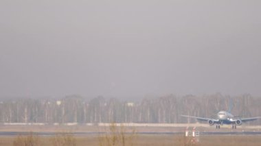 Civil jet airplane landing