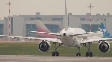 MOSCOW, RUSSIAN FEDERATION - JULY 28, 2021: Back view of cargo carrier Boeing 757 of E-Cargo Airlines taxis to the runway at Sheremetyevo Airport. Russian cargo company