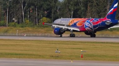 MOSCOW, RUSSIAN FEDERATION - JULY 31, 2021: Side view of Airbus A320 of Aeroflot braking after landing at Sheremetyevo airport SVO. Tourism and travel concept.