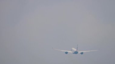 MOSCOW, RUSSIAN FEDERATION - JULY 30, 2021: Passenger airplane of Aeroflot departure, rear view on a long shot. Tourism and travel concept