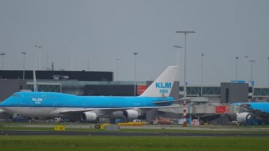 AMSTERDAM, THE NETHERLANDS - JULY 27, 2017: Footage of Boeing 747 KLM Airlines taxiing at Schiphol International Airport. KLM Dutch airline. Aviation and tourism concept
