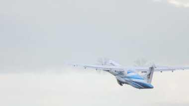 PHUKET, THAILAND - NOVEMBER 28, 2019: Long shot of airplane Bangkok airways ATR-72 take-off at Phuket international airport, Thailand. Tourism and travel concept, air flight