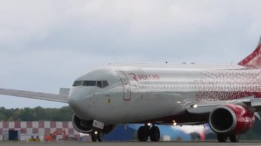 KAZAN, RUSSIAN FEDERATION - SEPTEMBER 14, 2020: Boeing 737 of Rossiya airline braking after landing at Kazan airport, Tatarstan. Jet plane on the airfield