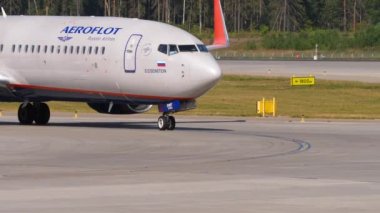 MOSCOW, RUSSIAN FEDERATION - JULY 31, 2021: Front view of Boeing 737 Aeroflot taxiing at Sheremetyevo. Aircraft arrival. Passenger plane on the airfield. Tourism and travel concept
