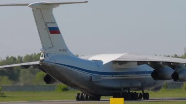 NOVOSIBIRSK, RUSSIAN FEDERATION - JUNY 12, 2022: Transport aircraft IL 76 arrival at Tolmachevo airport. Il-76 Soviet heavy military transport aircraft