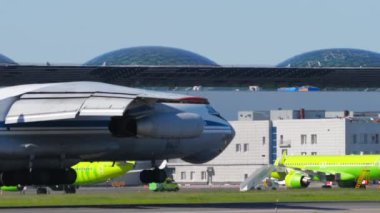 NOVOSIBIRSK, RUSSIAN FEDERATION - JUNY 12, 2022: Russian transport aircraft of IL 76 landing at Tolmachevo airport, slow motion