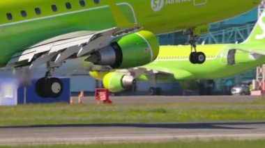 NOVOSIBIRSK, RUSSIAN FEDERATION - JUNY 12, 2022: Embraer E170SU, RA-02866 of S7 Airlines landing at Tomachevo Airport, Novosibirsk. Tourism and aviation concept