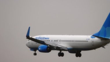 MOSCOW, RUSSIAN FEDERATION - JULY 28, 2021: Airplane Boeing 737 of Pobeda Airlines landing at Sheremetyevo International Airport, Moscow SVO