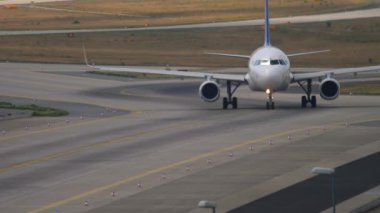 FRANKFURT AM MAIN, GERMANY - JULY 19, 2017: Airbus A320 of Air Astana taxiing on the airfield at Frankfurt Airport, Germany. Tourism and travel concept, air flight