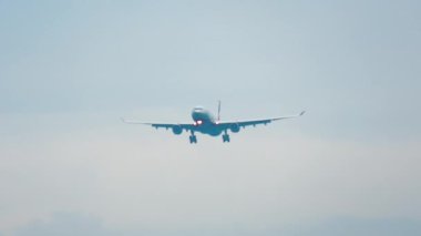 MOSCOW, RUSSIAN FEDERATION - JULY 30, 2021: Long shot of Airbus A330 Aeroflot approaching for landing at Sheremetyevo Airport, Moscow SVO. Tourism and travel concept
