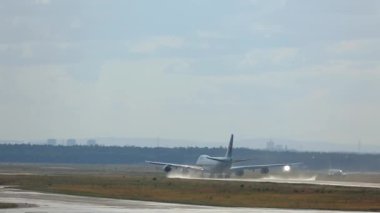 FRANKFURT AM MAIN, GERMANY - JULY 20, 2017: Four-engine wide-body aircraft taking off. Jumbo Jet of Korean Air picking up speed on the runway, rear view