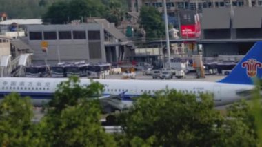 PHUKET, THAILAND - NOVEMBER 26, 2019: Commercial airplane of China Southern Airlines landing at Phuket airport. Tourism and travel concept