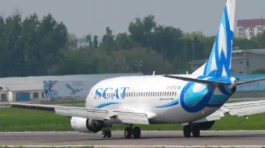 ALMATY, KAZAKHSTAN - MAY 4, 2019: Boeing 737 of SCAT Airlines departure, take off at Almaty airport, Kazakhstan. Tourism and travel concept, air flight.