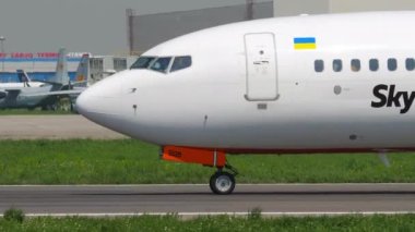 ALMATY, KAZAKHSTAN - MAY 4, 2019: Boeing 737 of SkyUp Airlines taxiing at Almaty airport, Kazakhstan. SkyUp Airlines is a private Ukrainian airline. Tourism and travel concept